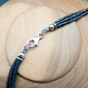 Item 201NH Hematite multistrand with Tibetan Pendant